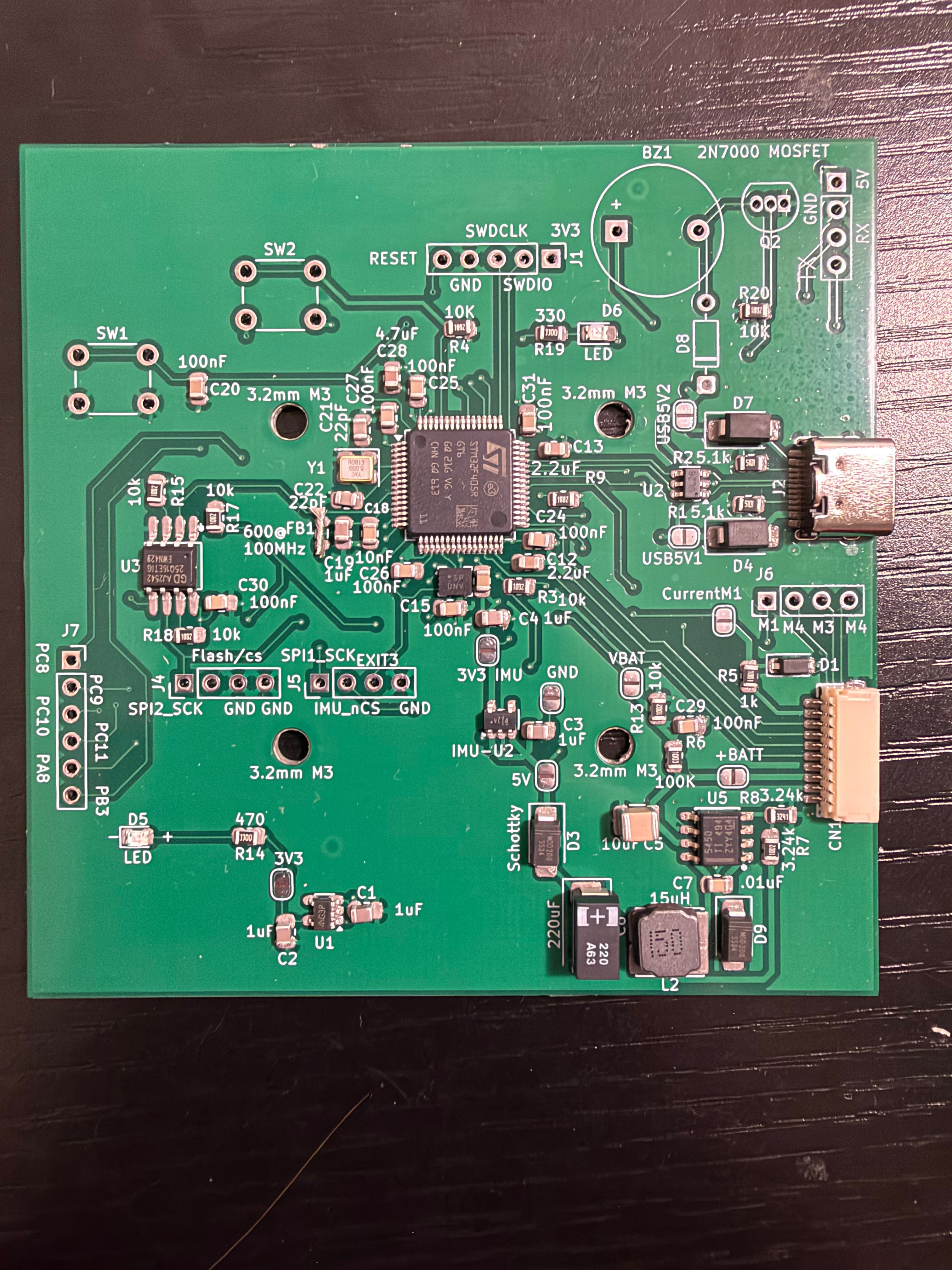 Assembled STM32F405 flight controller PCB after hotplate reflow